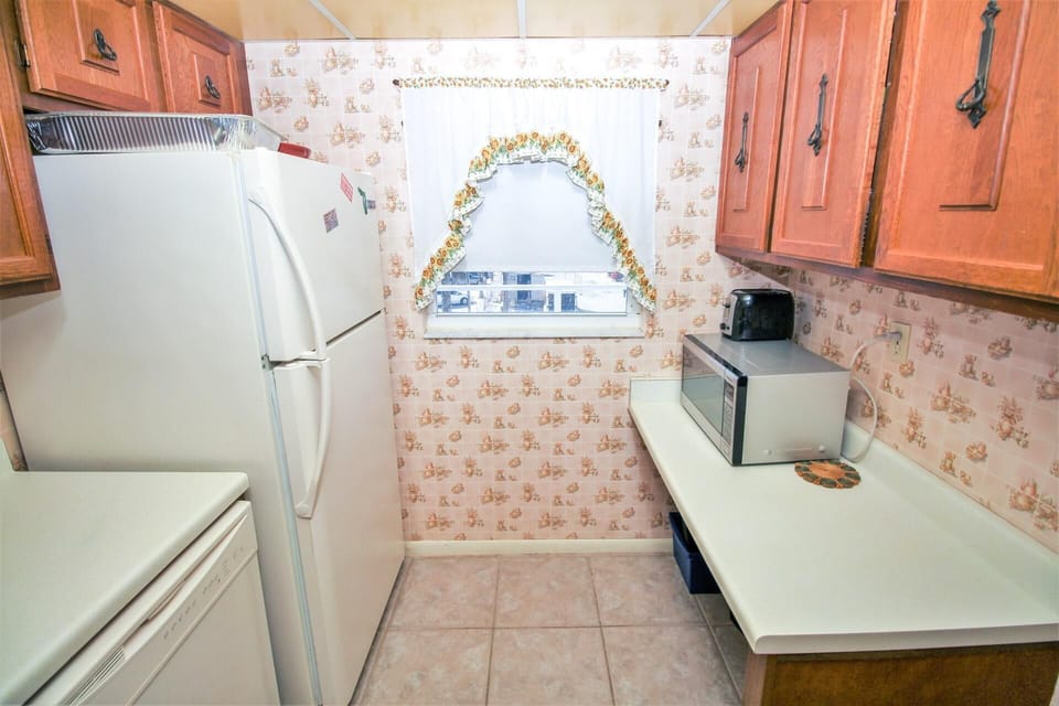 Condo, 1 King Bed with Sofa bed (Sea Coast Gardens III 303) | Private kitchen | Oven, toaster