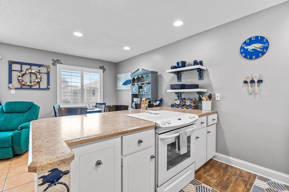 Condo, 1 King Bed (Colony Beach Club 210) | Private kitchen | Oven, coffee/tea maker, toaster, blender