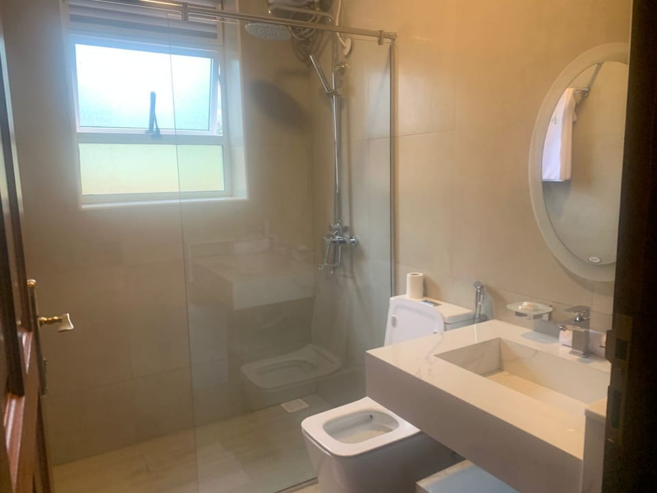 Shower, bathrobes, slippers, towels