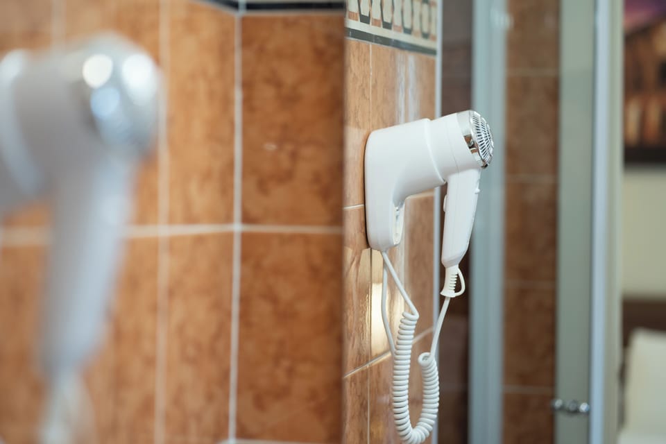 Comfort Room | Bathroom | Free toiletries, hair dryer, towels, soap