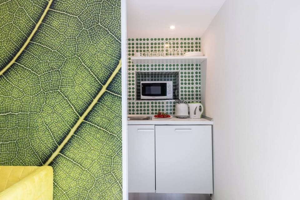Villa | Private kitchen | Espresso maker, coffee/tea maker, electric kettle, highchair
