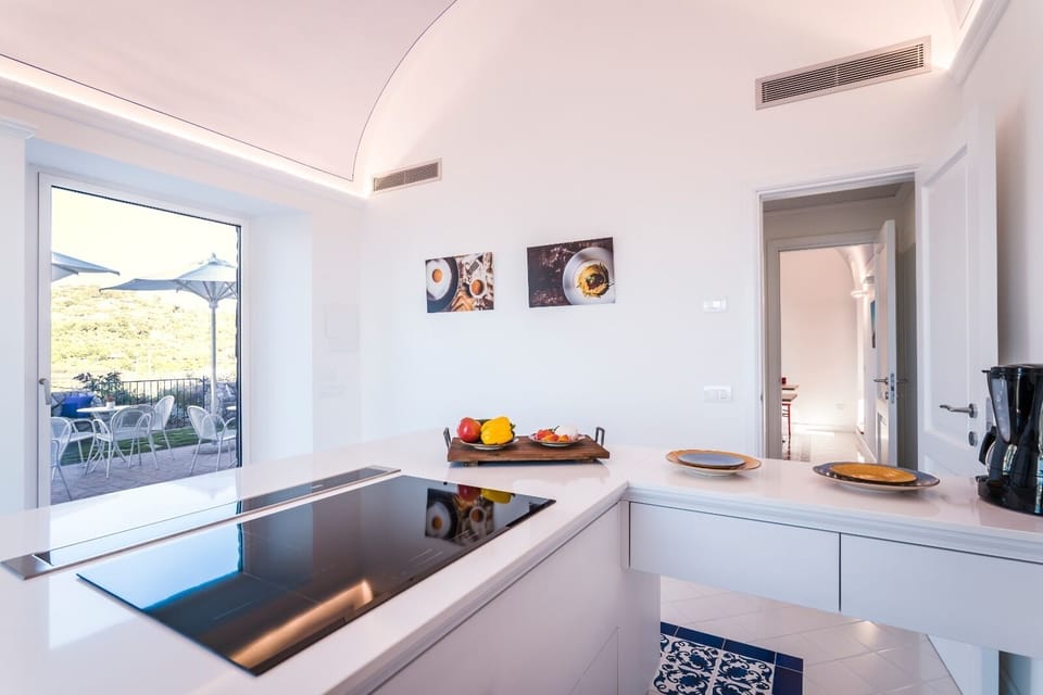 Luxury Villa | Private kitchen | Fridge, microwave, oven, stovetop