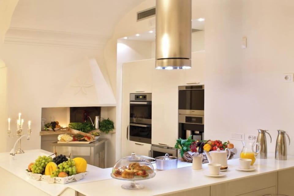 Villa | Private kitchen | Fridge, microwave, oven, stovetop