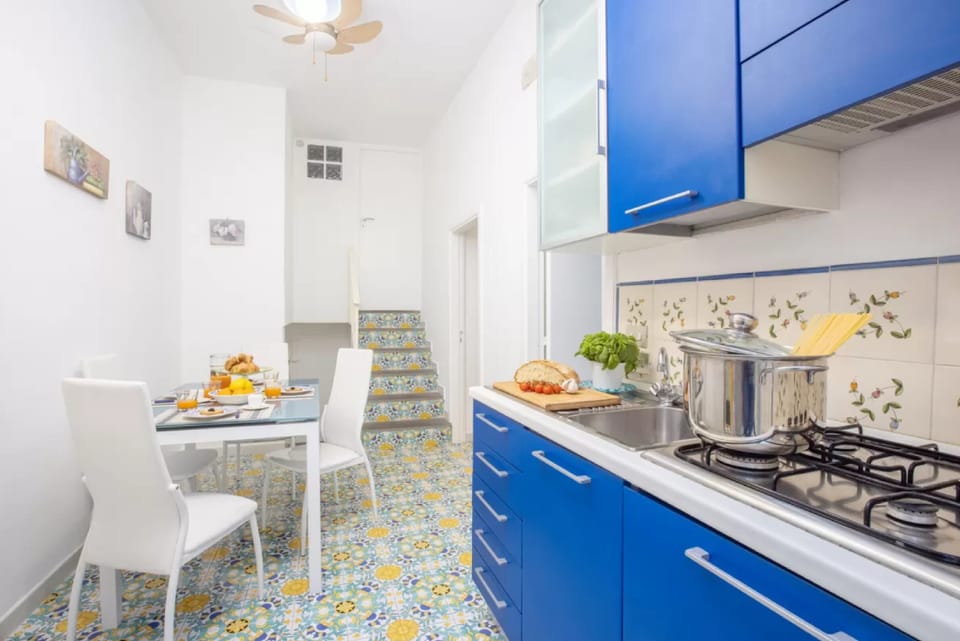 Apartment | Private kitchen | Full-size fridge, microwave, stovetop, coffee/tea maker