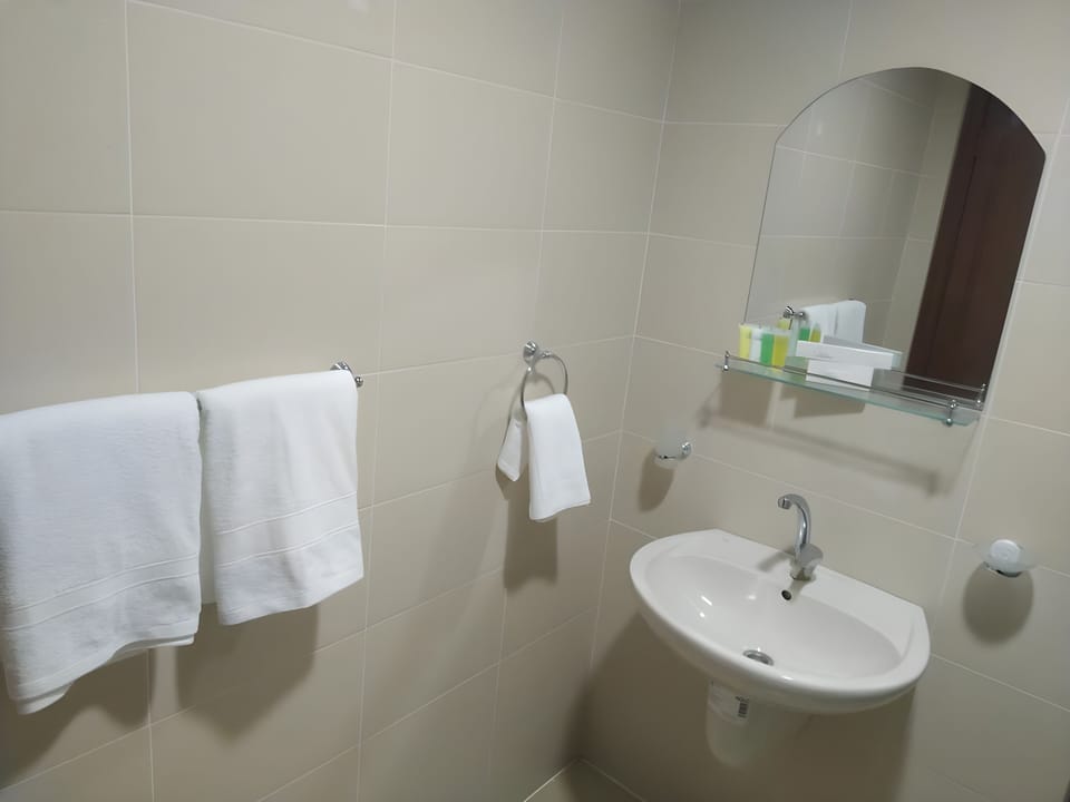 Slippers, bidet, towels, soap