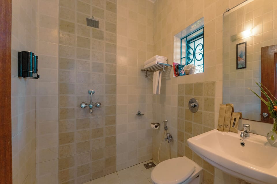 Shower, bathrobes, slippers, towels