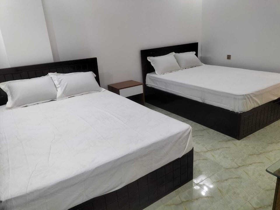 Deluxe Quadruple Room, City View | In-room safe, desk, free WiFi