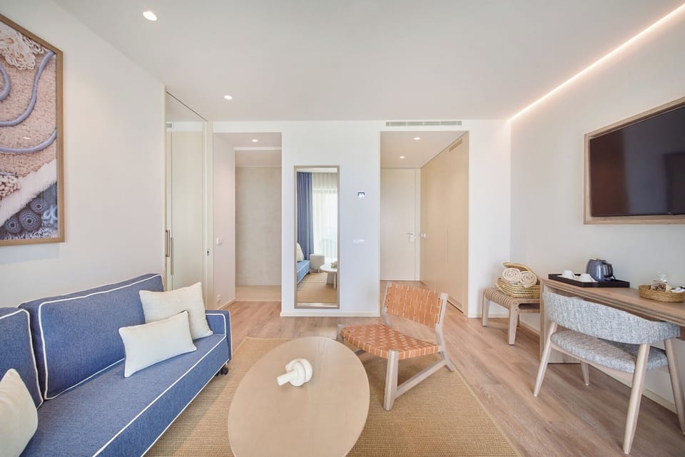 Suite, Sea View | Living area | 55-inch LCD TV with cable channels