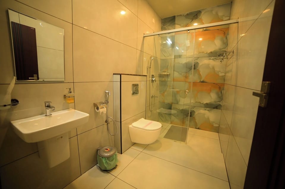 Shower, free toiletries, hair dryer, slippers