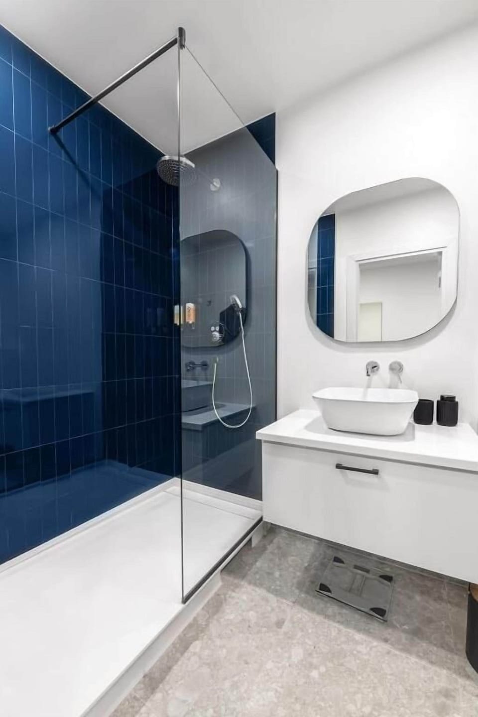 Quadruple Room | Bathroom | Shower, rainfall showerhead, hair dryer, slippers