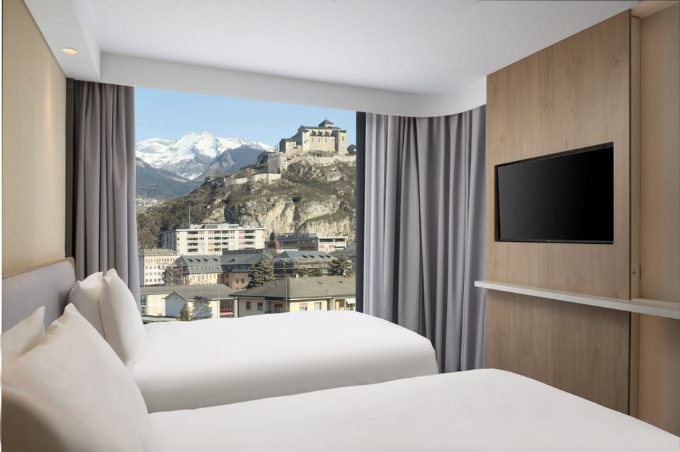 Premium bedding, pillowtop beds, in-room safe, desk