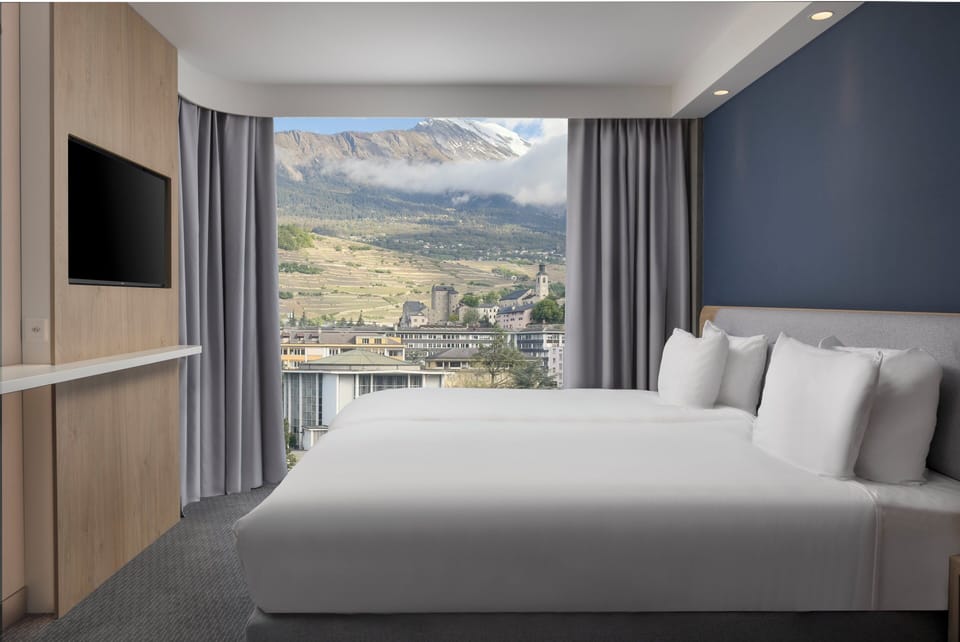 Premium bedding, pillowtop beds, in-room safe, desk
