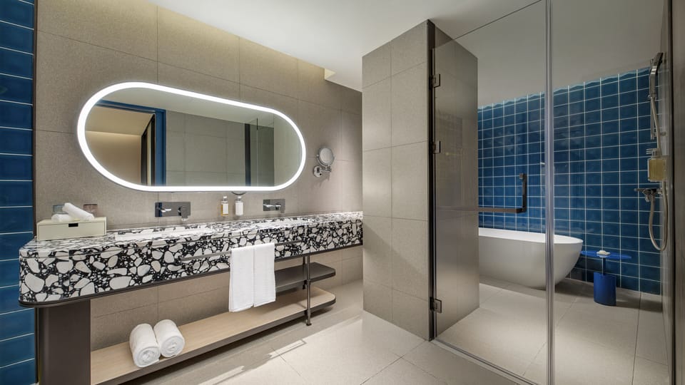 Suite, 1 Bedroom | Bathroom | Slippers, towels