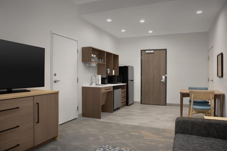 Suite, 1 King Bed, Accessible (Roll-In Shower) | Private kitchen | Coffee/tea maker