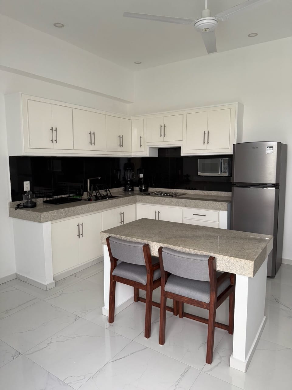Standard Double Room | Private kitchen | Fridge, microwave, cookware/dishes/utensils