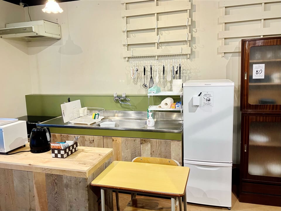 Coffee/tea maker, shared fridge, shared microwave