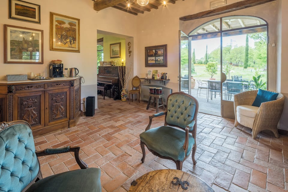 Villa, Lake View | Living area | 32-inch TV with cable channels