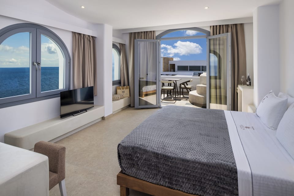 Deluxe Double Room, Sea View | In-room safe, blackout drapes, soundproofing, iron/ironing board
