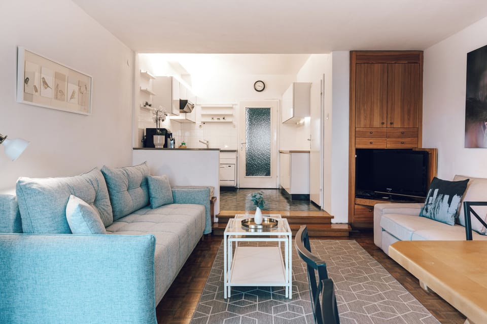 Comfort Apartment, 2 Bedrooms, Lake View | Living area | 50-inch flat-screen TV with cable channels