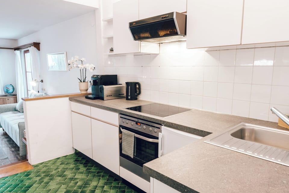 Comfort Apartment, 2 Bedrooms, Lake View | Private kitchen | Electric kettle, highchair