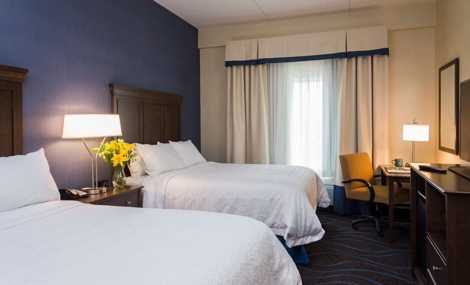 Room, 2 Queen Beds, Refrigerator & Microwave | Down comforters, free WiFi, bed sheets