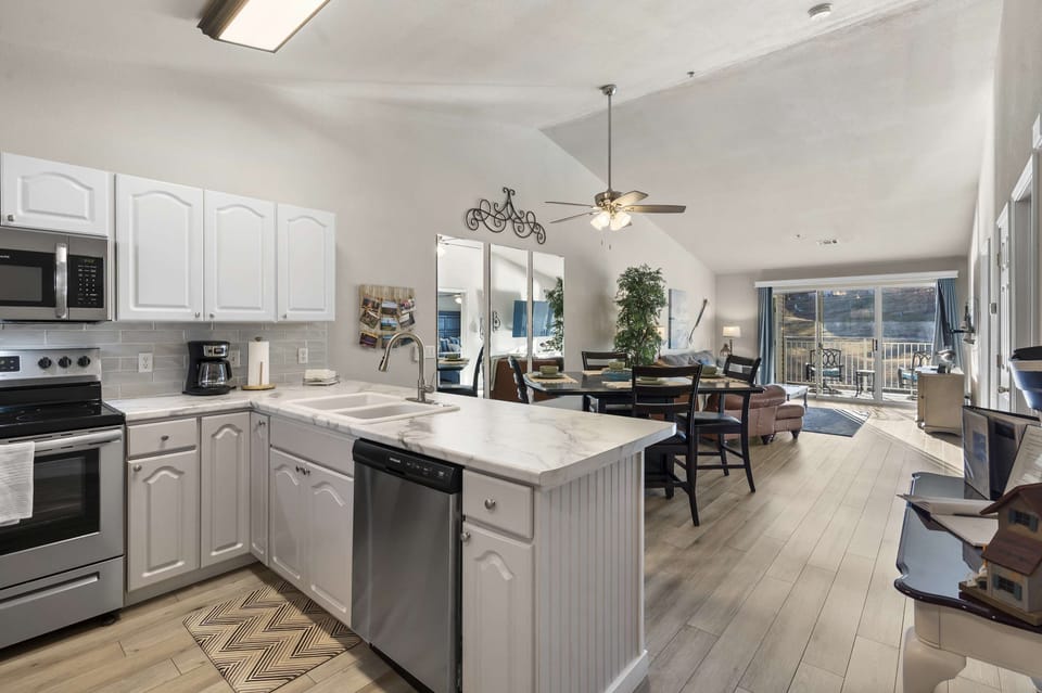 Condo, 1 King Bed with Sofa bed, Balcony, Golf View (Calm Waters Condo) | Private kitchen | Fridge, microwave, oven, stovetop