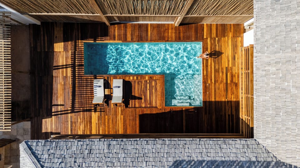 Outdoor pool, open 9:00 AM to 9:00 PM, sun loungers