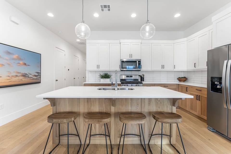 Townhome, 4 Bedrooms | Private kitchen | Coffee/tea maker, fridge, oven, stovetop