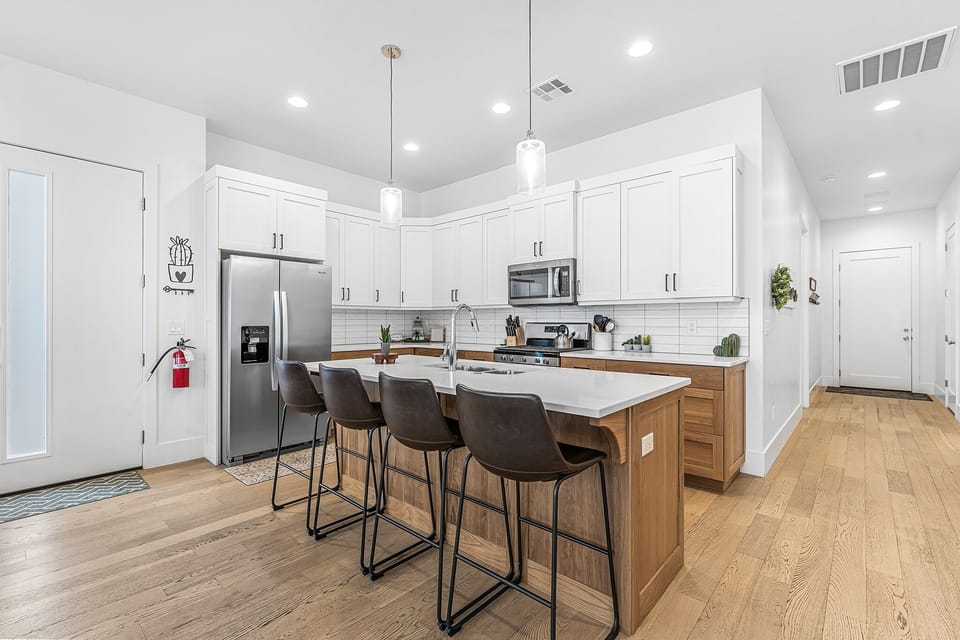 Townhome, 4 Bedrooms | Private kitchen | Coffee/tea maker, fridge, oven, stovetop