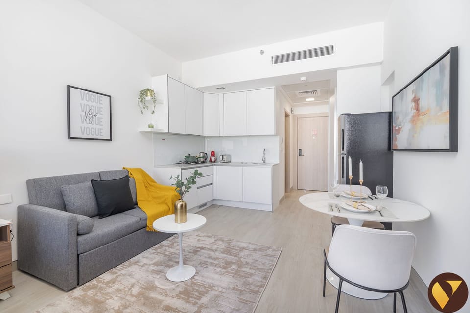 Luxury Studio, City View | Living area | 50-inch Smart TV with cable channels