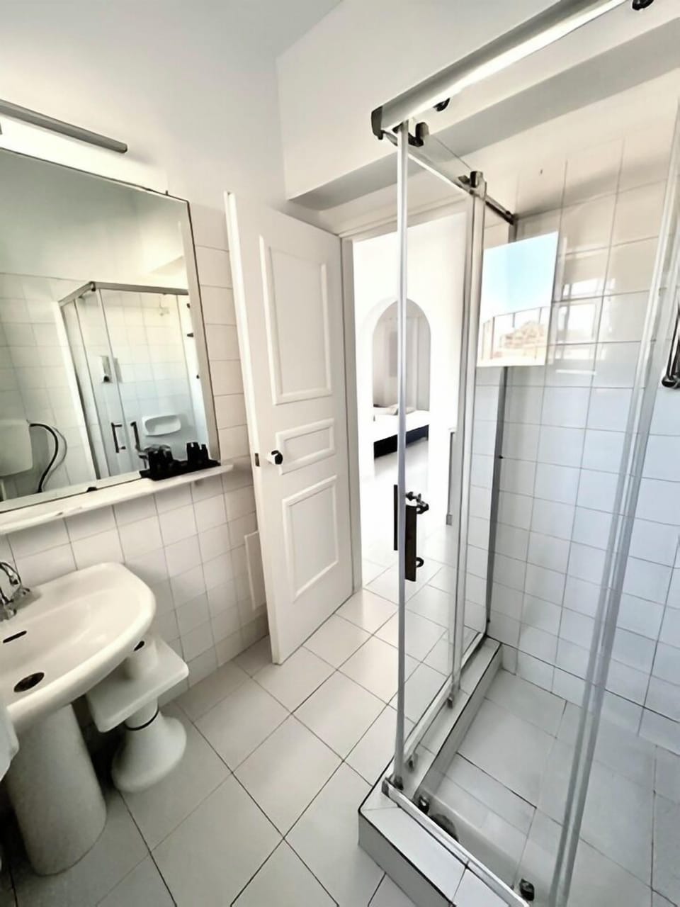 Hair dryer, slippers, towels, soap