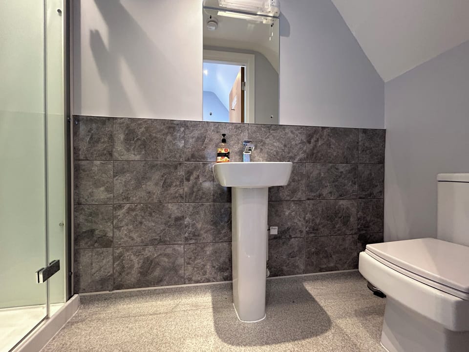 Shower, free toiletries, hair dryer, towels