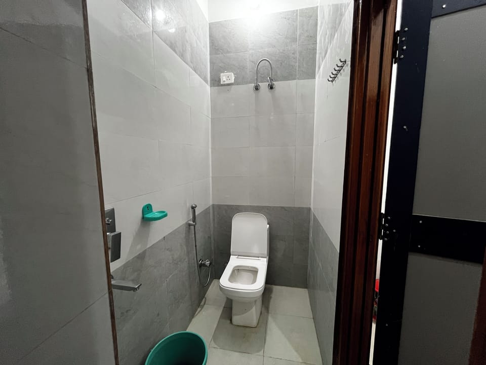 Comfort Room | Bathroom | Shower, slippers, towels, soap
