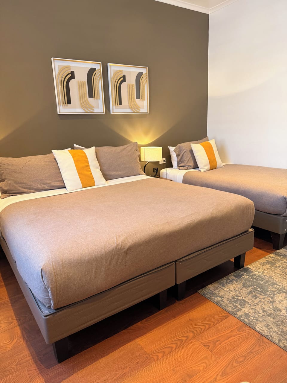 Deluxe Triple Room, Multiple Beds | Down comforters, desk, WiFi (free), individually decorated