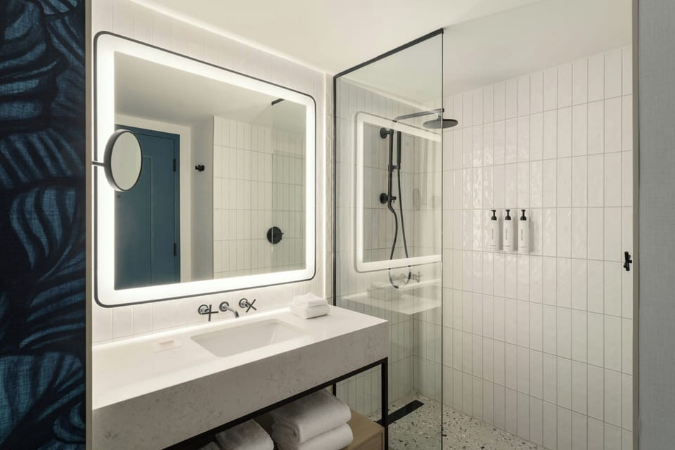 Hair dryer, bathrobes, slippers, towels