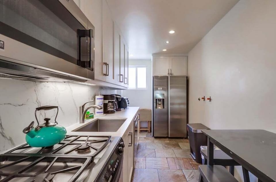 Condo, Multiple Beds, Kitchen, Beach View | Private kitchen | Coffee/tea maker, electric kettle