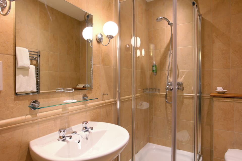 Shower, free toiletries, hair dryer, towels