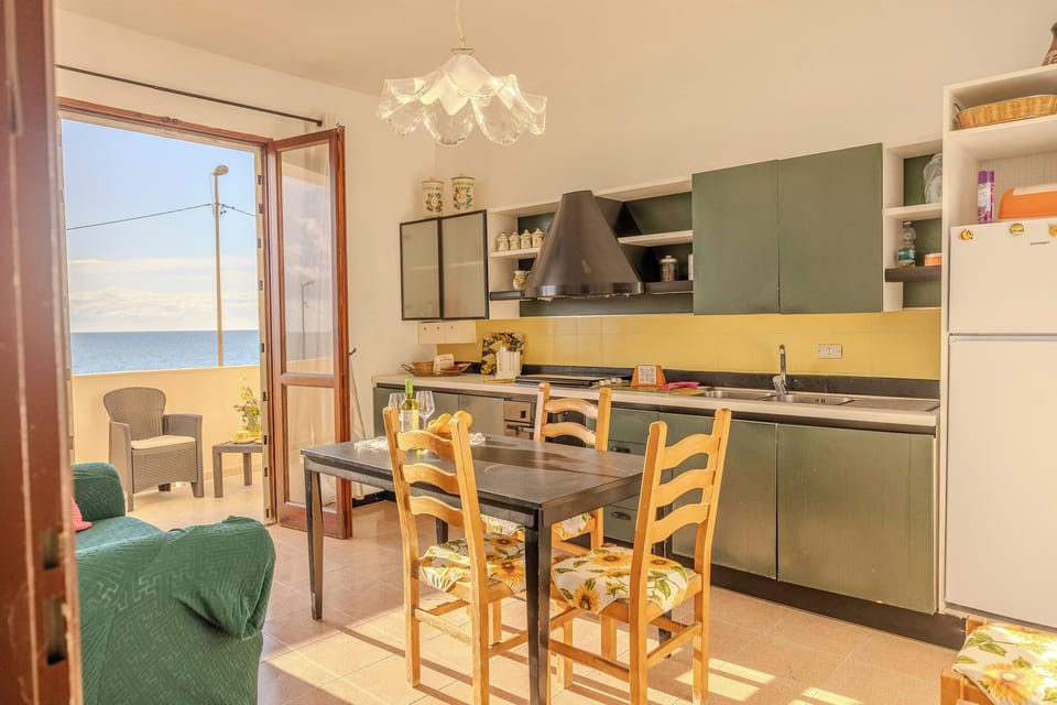 Apartment, Sea View | Private kitchen | Coffee/tea maker, electric kettle, cookware/dishes/utensils