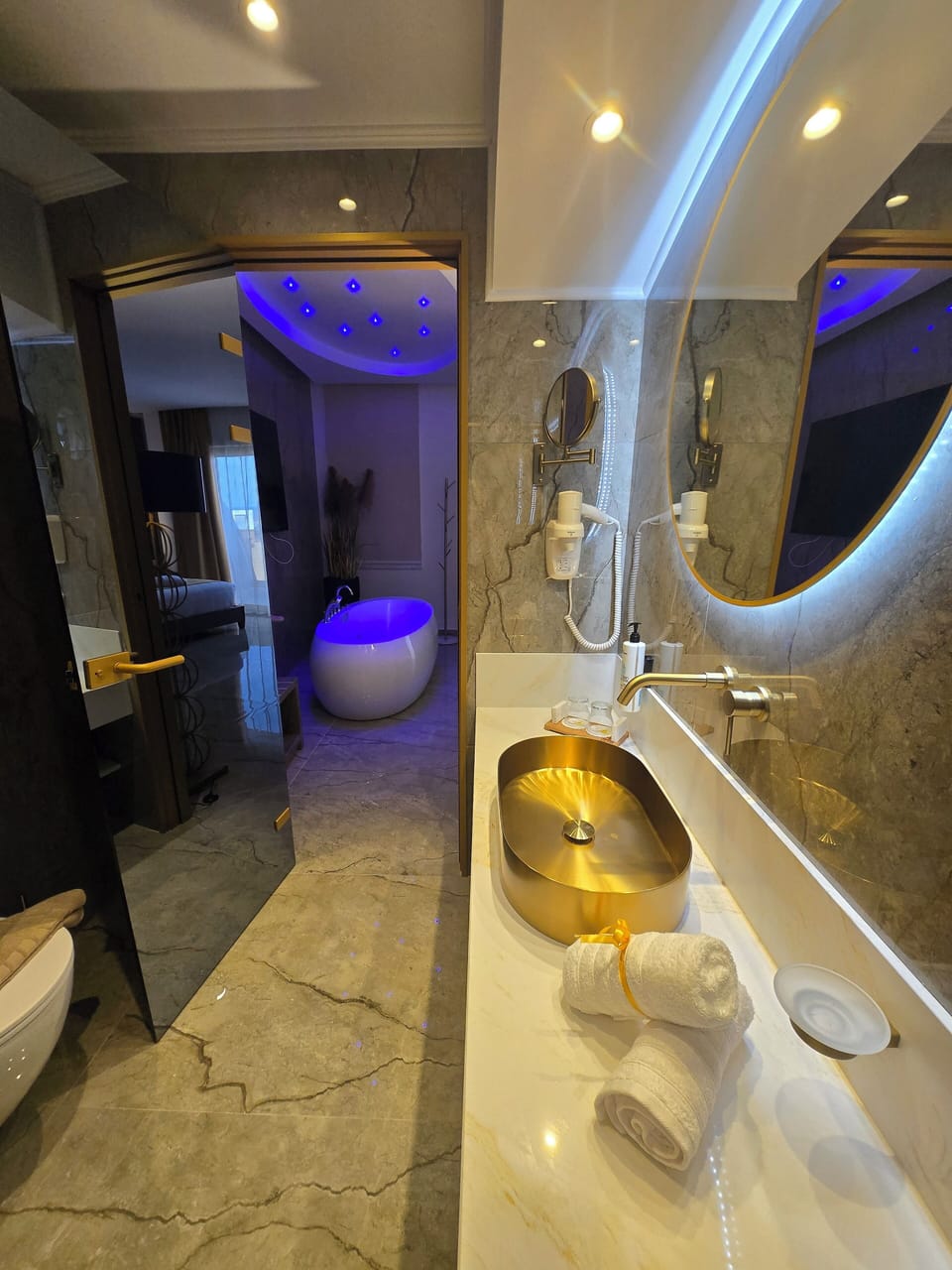 Elite Suite, Sea View | Bathroom | Shower, hair dryer, bathrobes, slippers