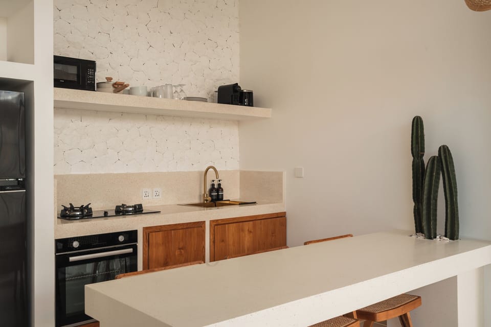 Deluxe Villa, 1 King Bed, Balcony, Pool View | Private kitchen | Coffee/tea maker, toaster, freezer, kitchen islands