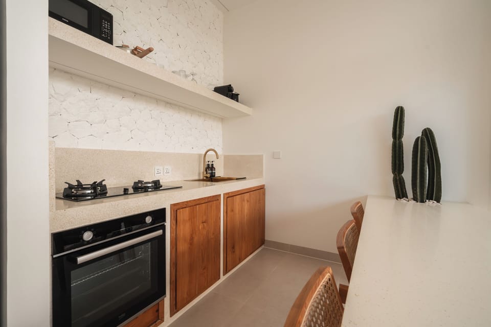 Deluxe Villa, 1 King Bed, Balcony, Pool View | Private kitchen | Coffee/tea maker, toaster, freezer, kitchen islands