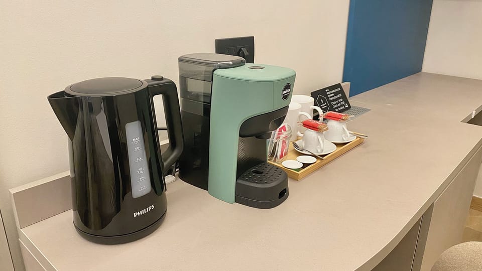 Coffee/tea maker, mini-fridge, microwave, electric kettle