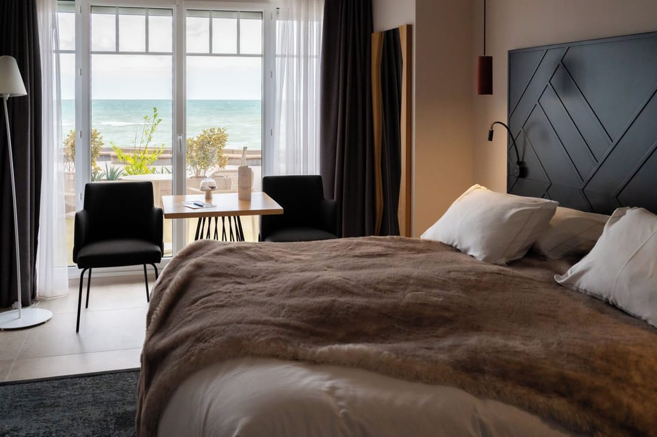 Exclusive Double or Twin Room, Balcony, Sea View | Minibar, in-room safe, soundproofing, iron/ironing board