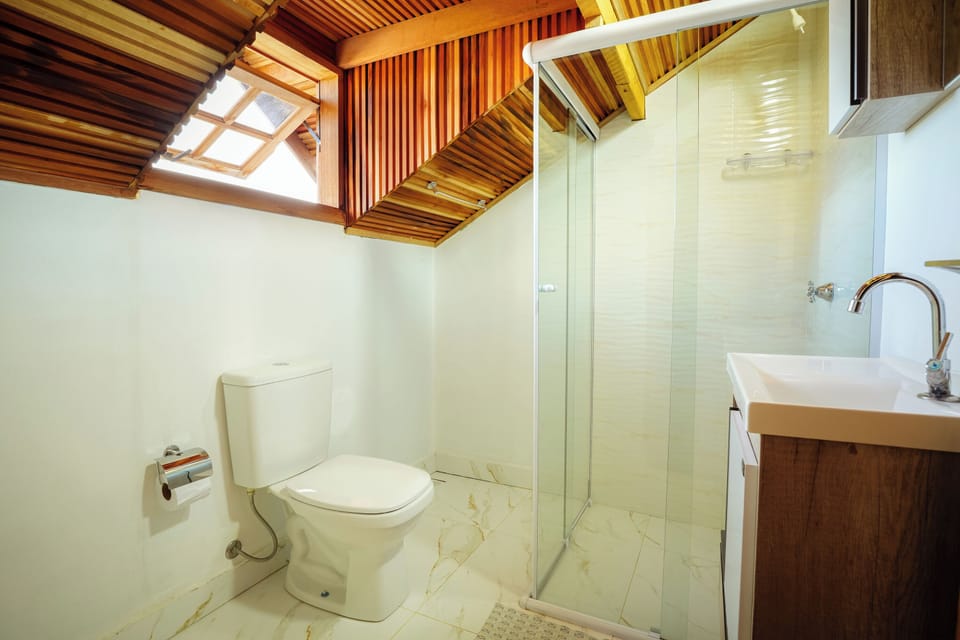 Economy Chalet | Bathroom | Shower, towels, soap, toilet paper
