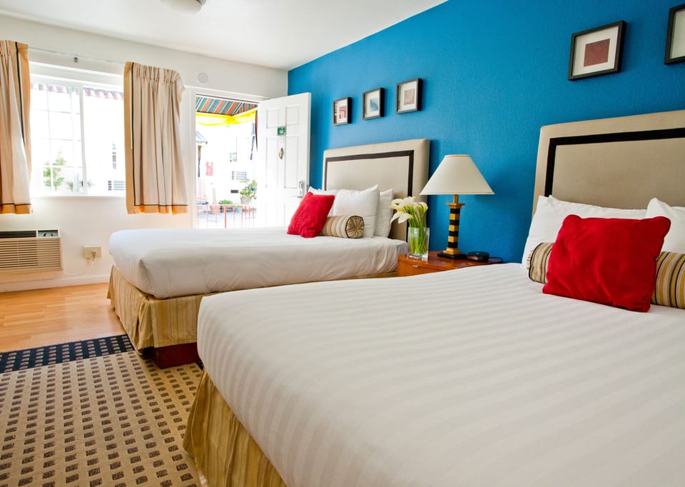Standard Room, 2 Queen Beds | Premium bedding, down comforters, blackout drapes, iron/ironing board