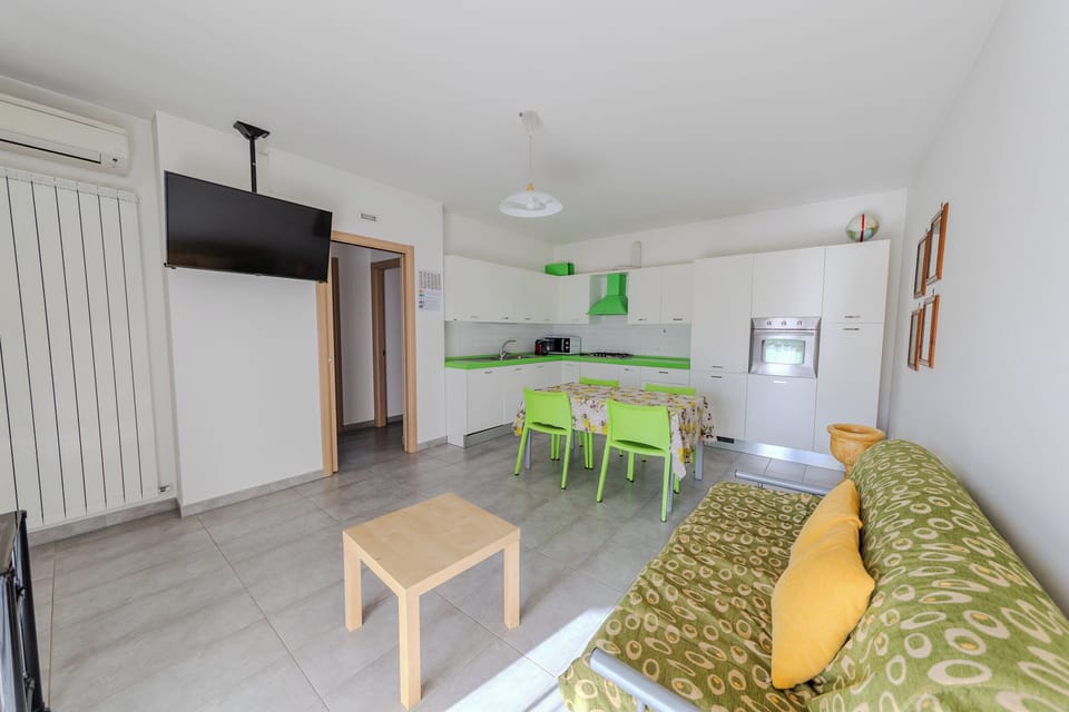 Apartment, Sea View | Private kitchen | Full-size fridge, microwave, oven, stovetop