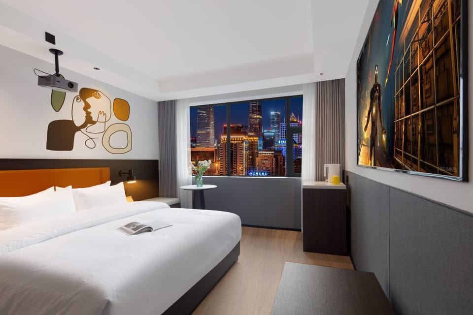 Comfort Double Room, City View | Down comforters, laptop workspace, blackout drapes, soundproofing