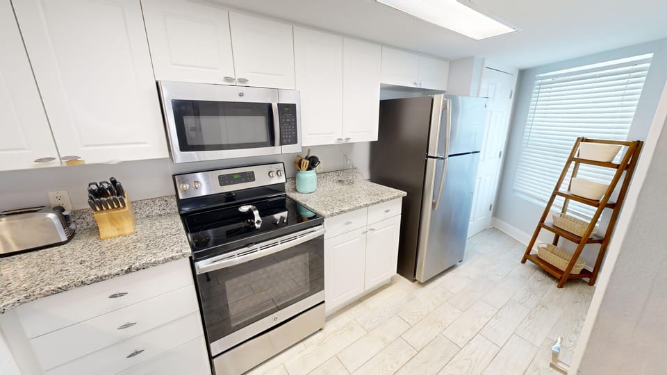 Condo, 2 Bedrooms | Private kitchen | Fridge, coffee/tea maker, toaster