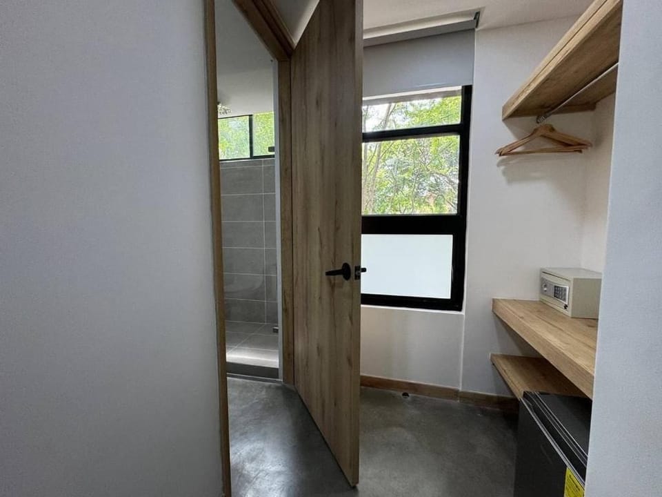 Comfort Triple Room, city view | Minibar, in-room safe, blackout drapes, iron/ironing board (on request)