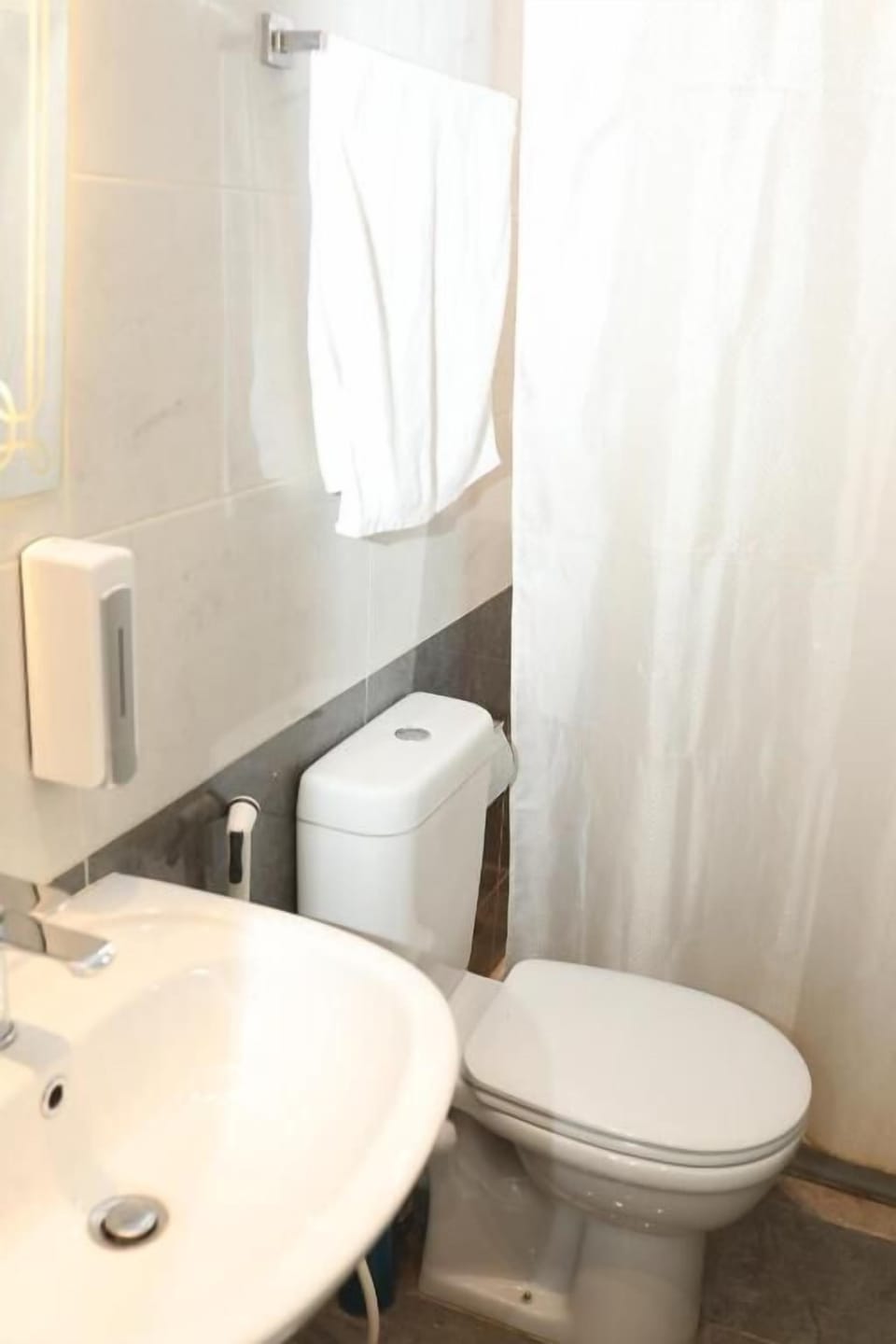 Combined shower/tub, hair dryer, towels, soap